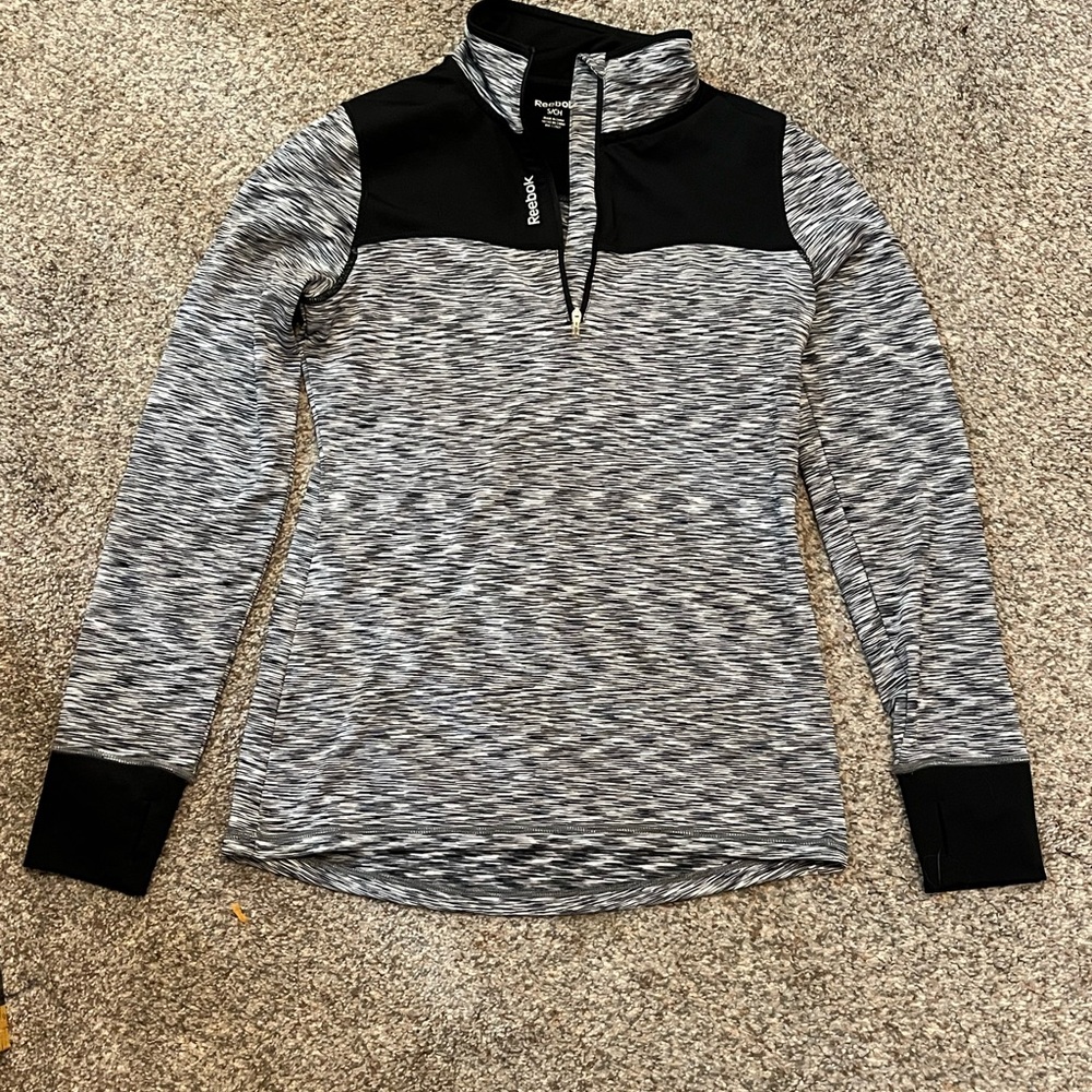 Woman’s Reebox pullover size small -new without tags